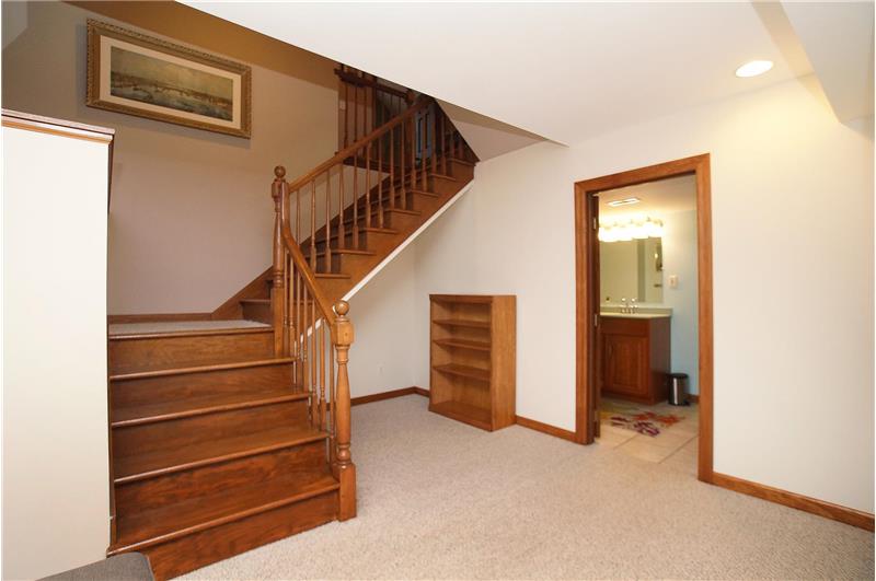 Stairwell to partially finished lower level