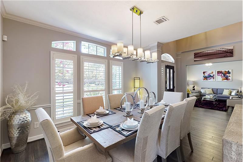 The dining room is off the entry with large windows that give off plenty of natural light.