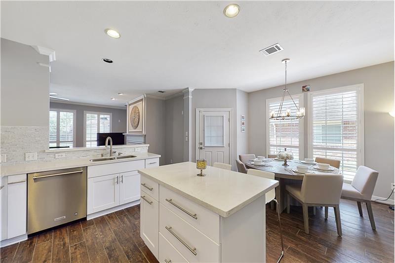 The kitchen has great counter space and opens to the breakfast area.