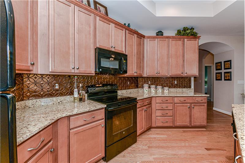 42-inch cabinets provide abundant storage space. There's also a large pantry for even more storage.