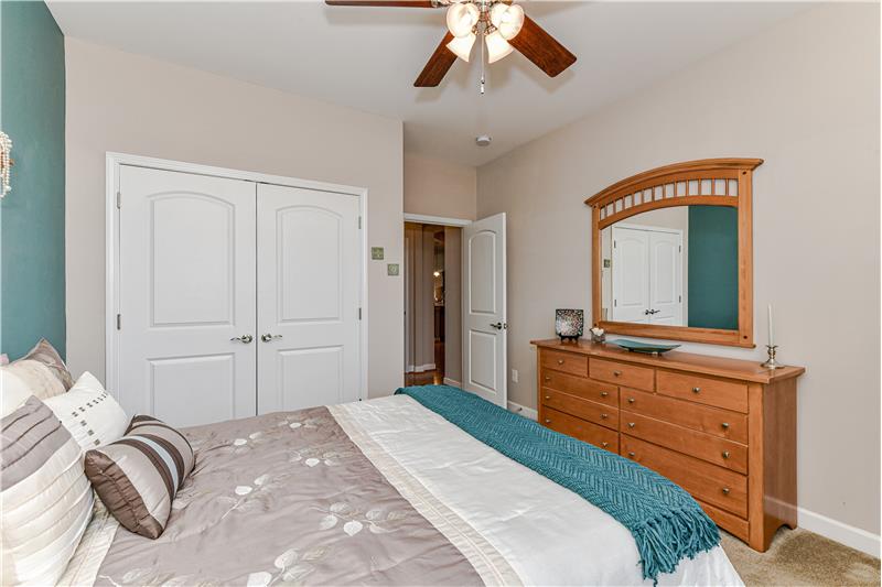 Home's split bedroom plan maximizes privacy for homeowners and guests.