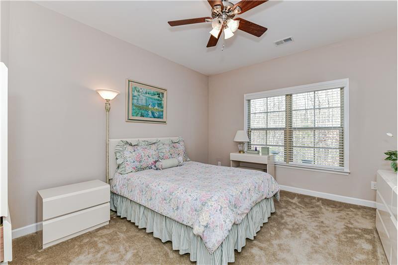 Home's third bedroom situated on the finished lower level has great natural light.