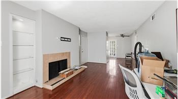 Built in shelves around wood burning fireplace