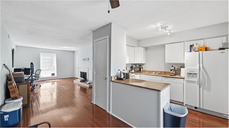 Open kitchen with granite countertops