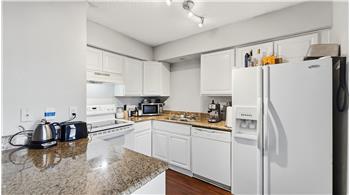 Open kitchen with granite countertops
