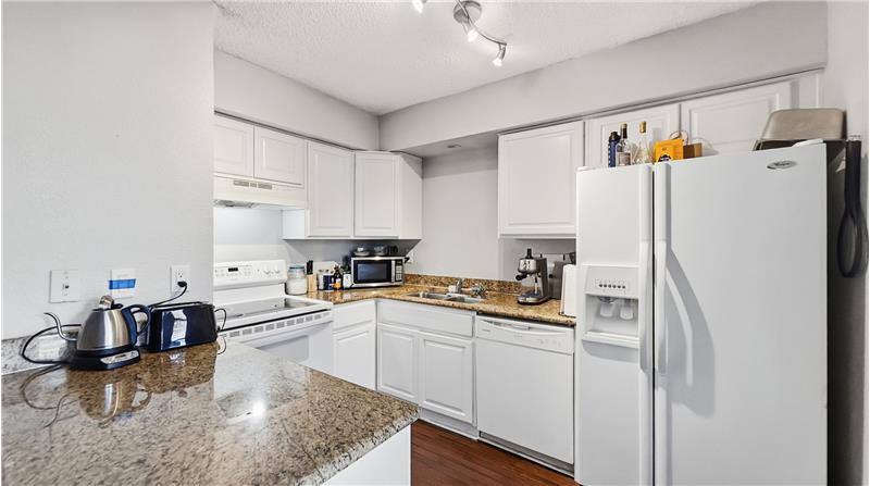 Open kitchen with granite countertops