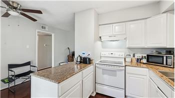 Open kitchen with granite countertops
