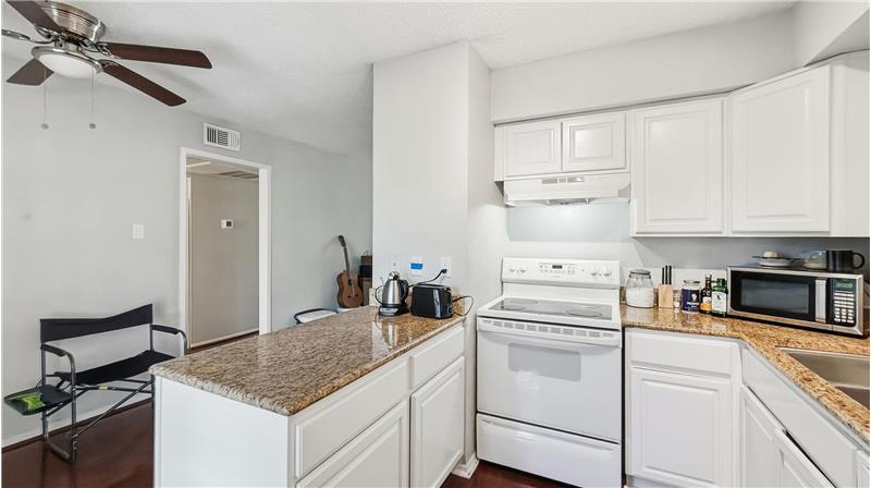 Open kitchen with granite countertops