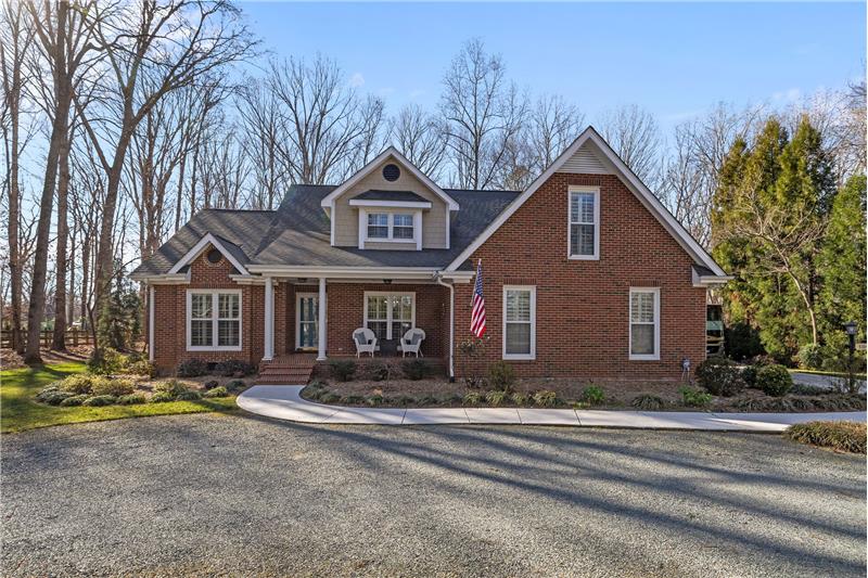 Gorgeous curb appeal... Southern charm charm and living at its best.