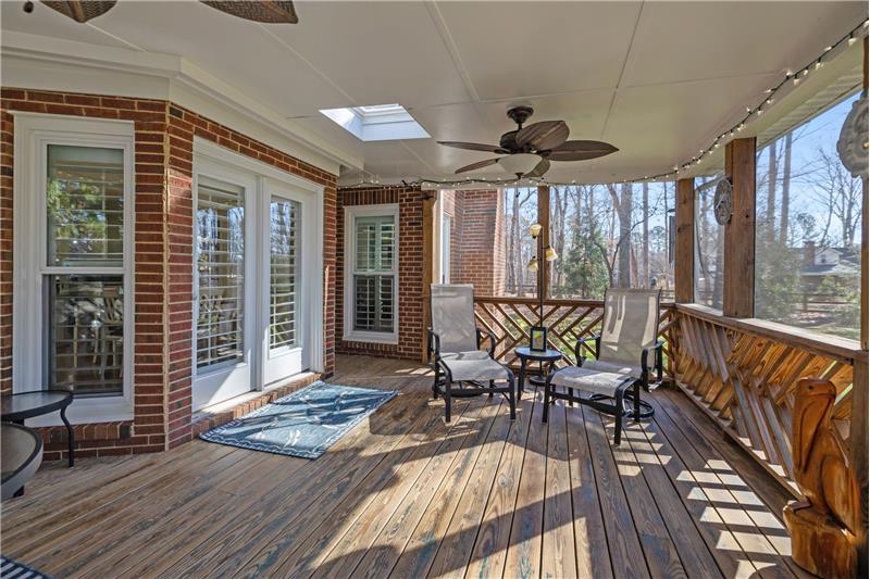 Screened porch great for relaxing, enjoying a morning coffee, an evening cocktail, while remaining protected from the elements.