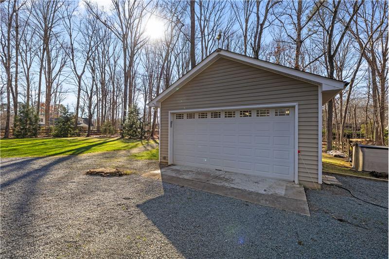 Full insulated 2-car, detached garage is perfect for workshop, storage, hobby space, or parking.