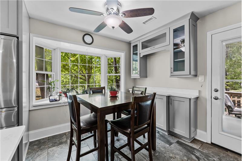 Sunny breakfast area with bay window