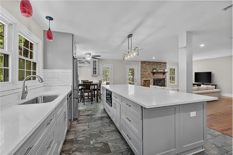 Open sight lines from kitchen to breakfast area, great room, dining room