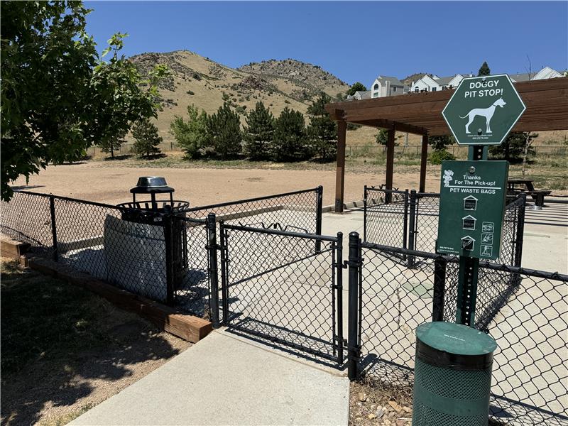 Off-leash dog park just across the pedestrian bridge