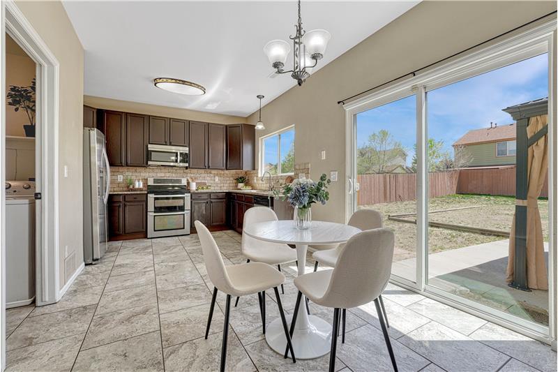 Eat-in kitchen walks out to the backyard