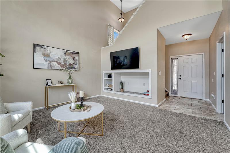 Back inside, view of living room and entry