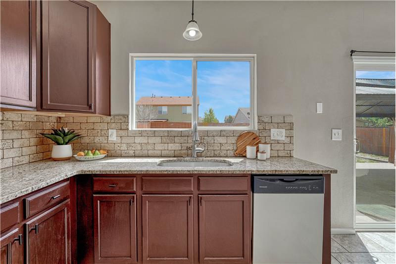 Dining Area	Window over the single basin kitchen sink!