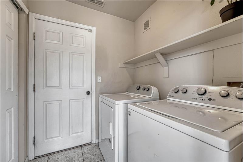 Laundry area with large closet. Washer/Dryer stay!