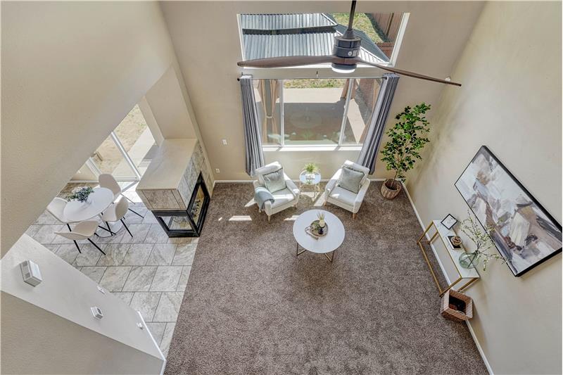 Looking down into the living room from upper level