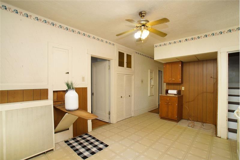 Kitchen with built in ironing board