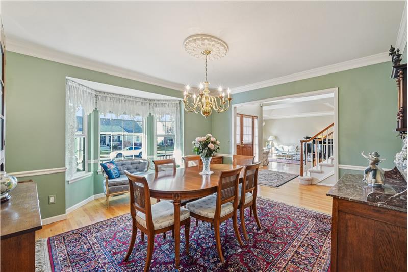 Formal dining room showing bay window and foyer