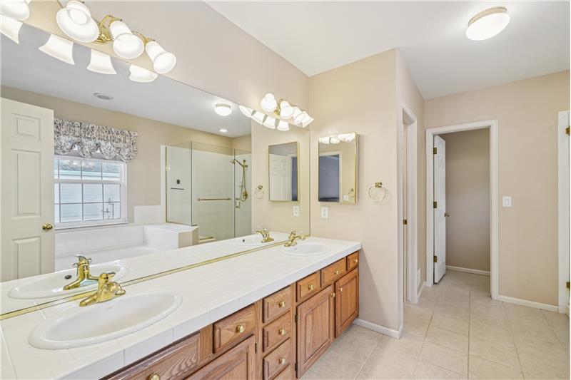 Ensuite bathroom in primary suite