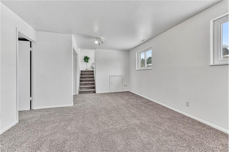 Stairs from the Main Level to the Lower Level Family Room