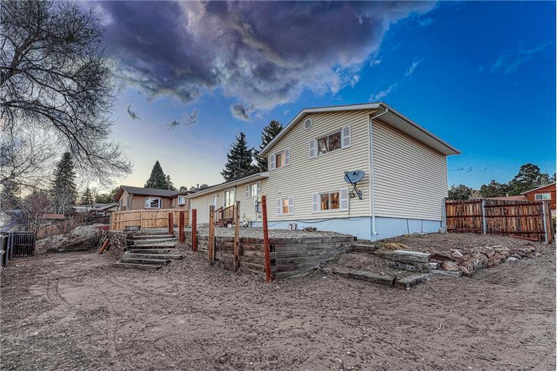 Sunset View of Fenced Backyard