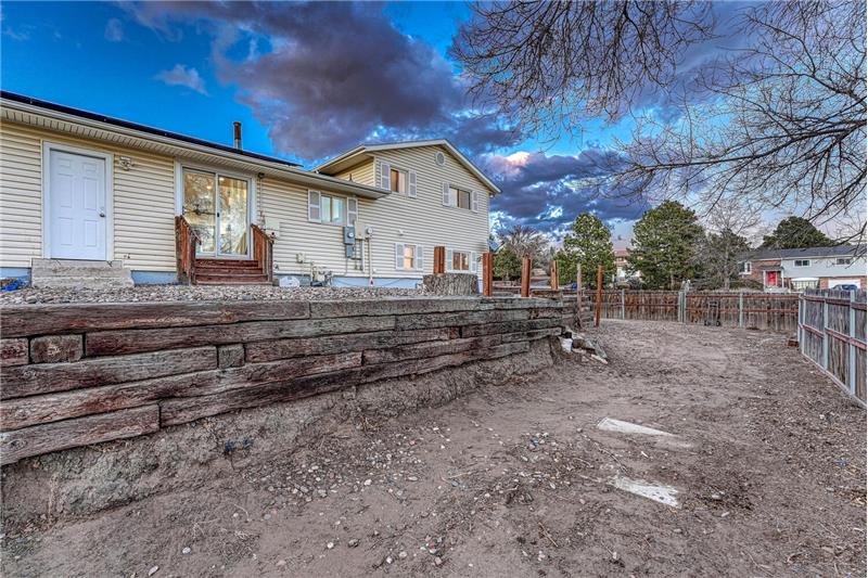 Large Fenced Terraced Lot with Stairs to the Lower Level Yard