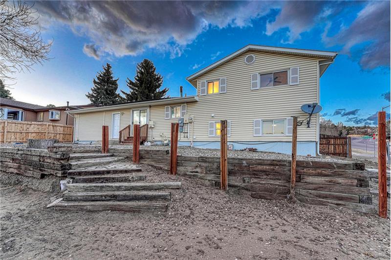 Large Fenced Terraced Lot with Stairs to the Lower Level Yard