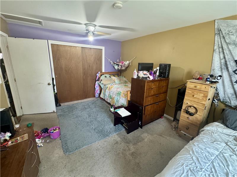 Reverse view of bedroom. Closet is full width of bedroom