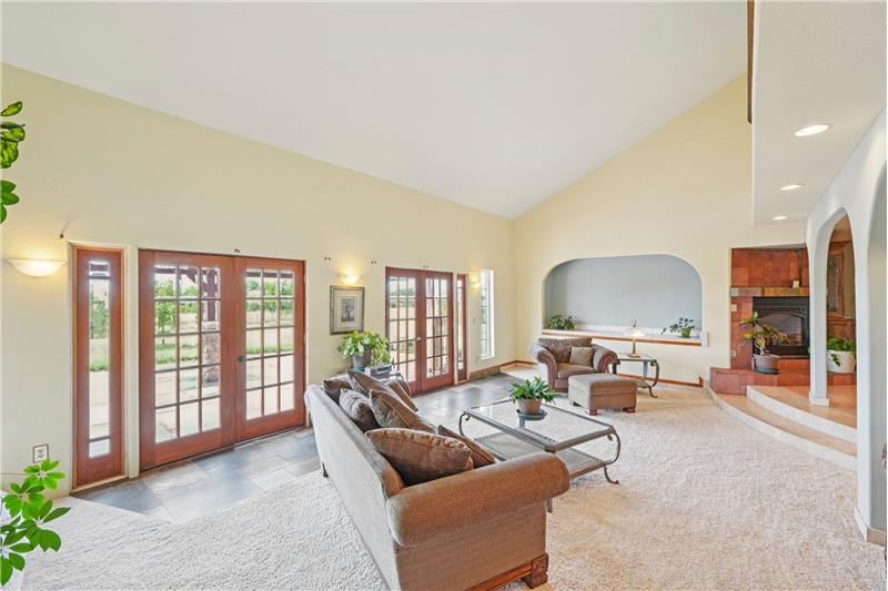 Living room, showing doors to patio with pergola