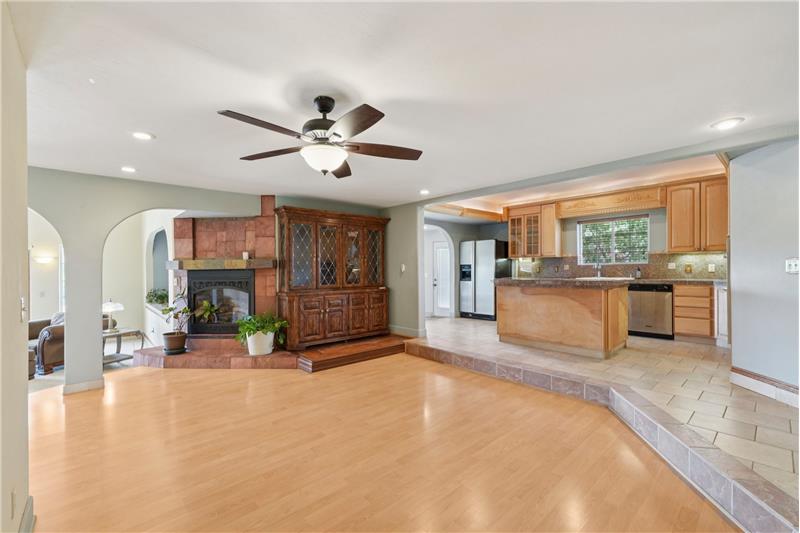 Dining room with living room and kitchen beyond