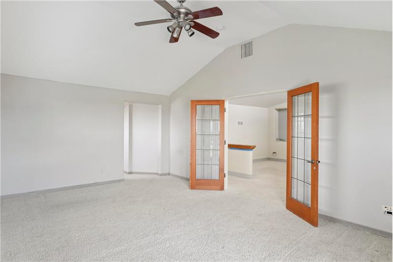 West bedroom has French doors to loft