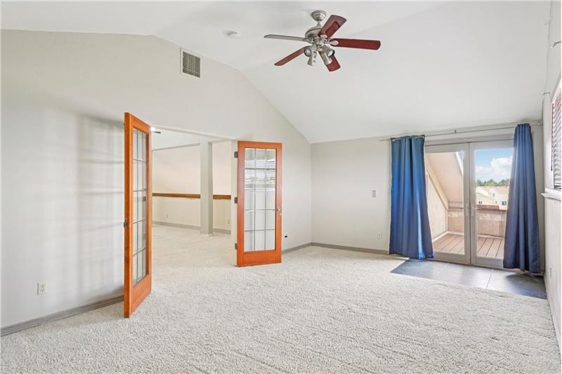 West bedroom has door to balcony overlooking pasture