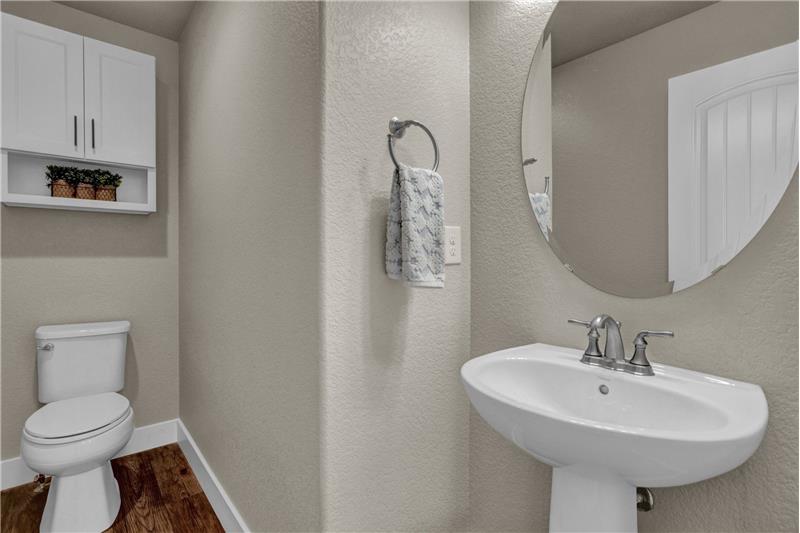 Main Level Powder Bathroom with Pedestal Sink