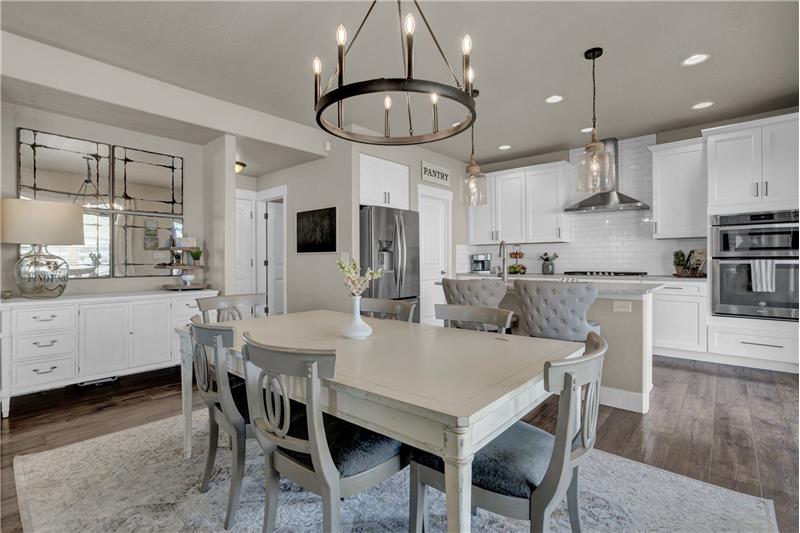 Dining Room with Beautiful Contemporary Light Fixture