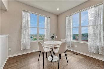 The Dining Area features fabulous views and wood laminate flooring.
