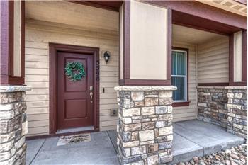 Enjoy peaceful open space views from the covered front porch, the perfect spot to relax!