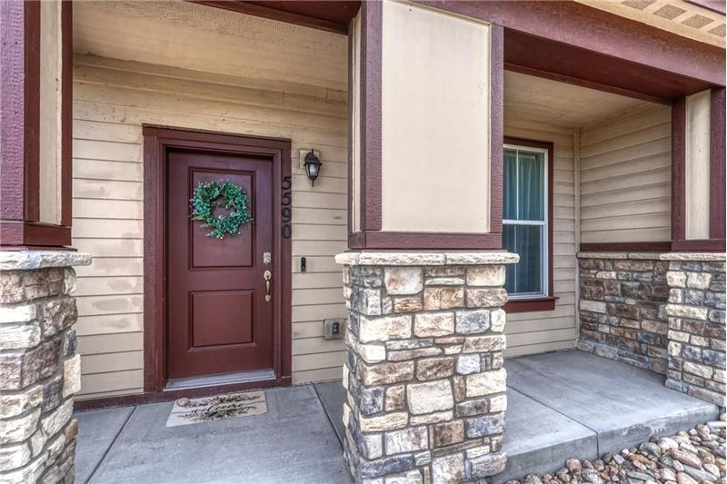 Enjoy peaceful open space views from the covered front porch, the perfect spot to relax!