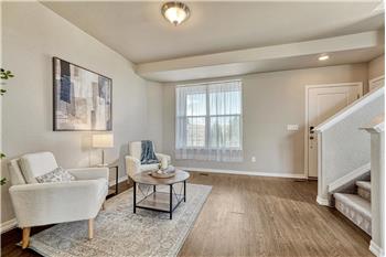 Living Room with stairs to the upper level.