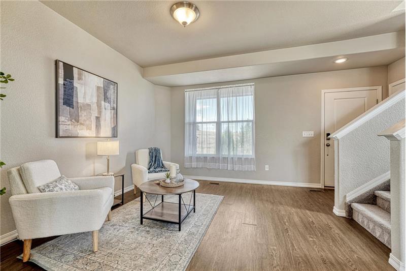 Living Room with stairs to the upper level.
