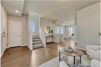 Open floor plan where one floor flows from one room to another.