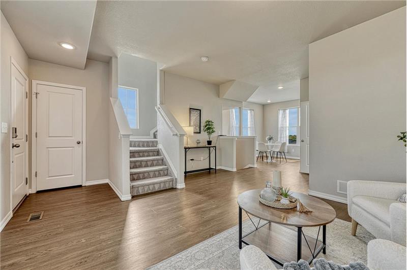 Open floor plan where one floor flows from one room to another.