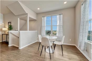 The dining room showcases fabulous views & provides easy access to the kitchen for effortless entertaining & cleanup.