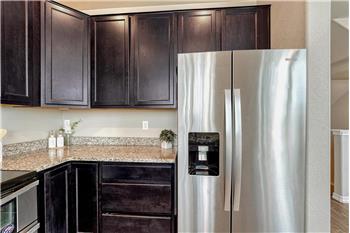 Side by side stainless steel refrigerator.