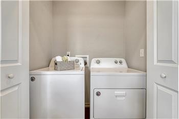 Upper level Laundry Closet with washer and dryer included.