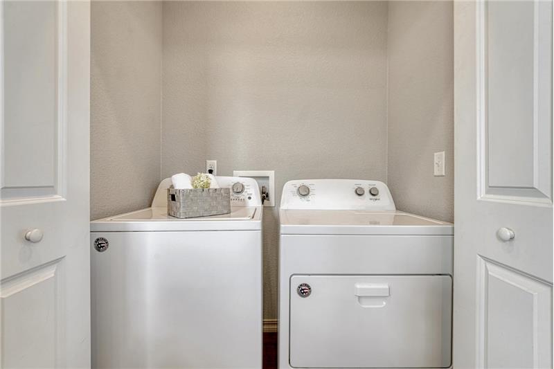 Upper level Laundry Closet with washer and dryer included.