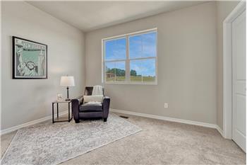 Upper level Bedroom #2 has neutral carpet, private adjoining Full Bathroom, and walk in closet.