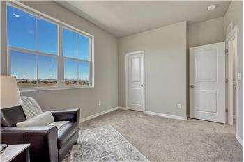 Upper level Bedroom #2 with large view window.
